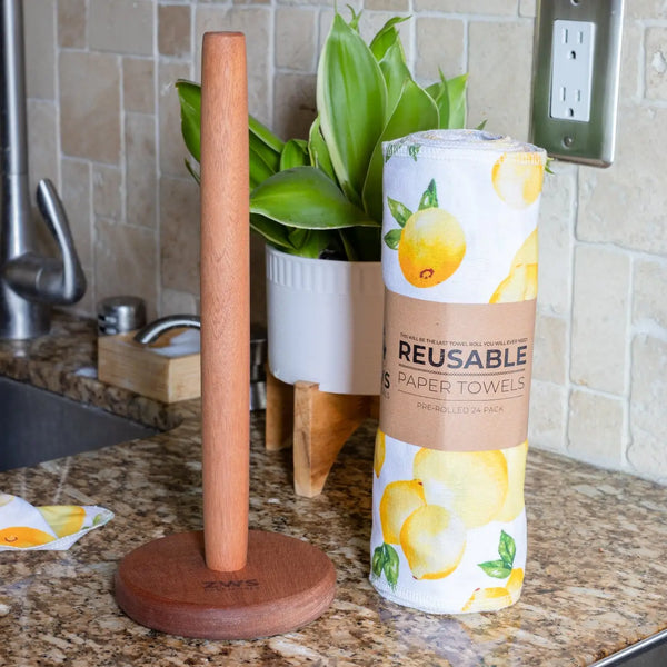 Reusable paper towel roll with wooden holder on a kitchen counter