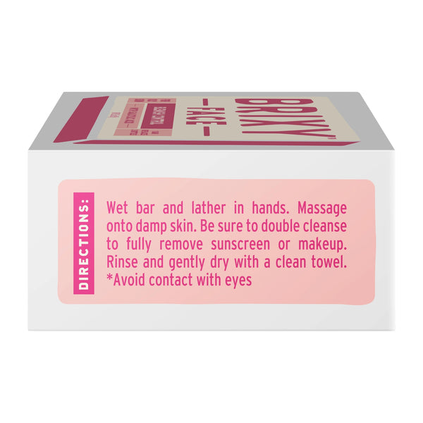 Bar of soap with pink label and directions on a white background