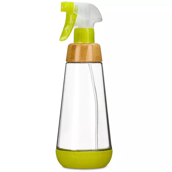 clear glass spray bottle with a green & clear plastic nozzle, bamboo collar, and green silicone bottom. white background