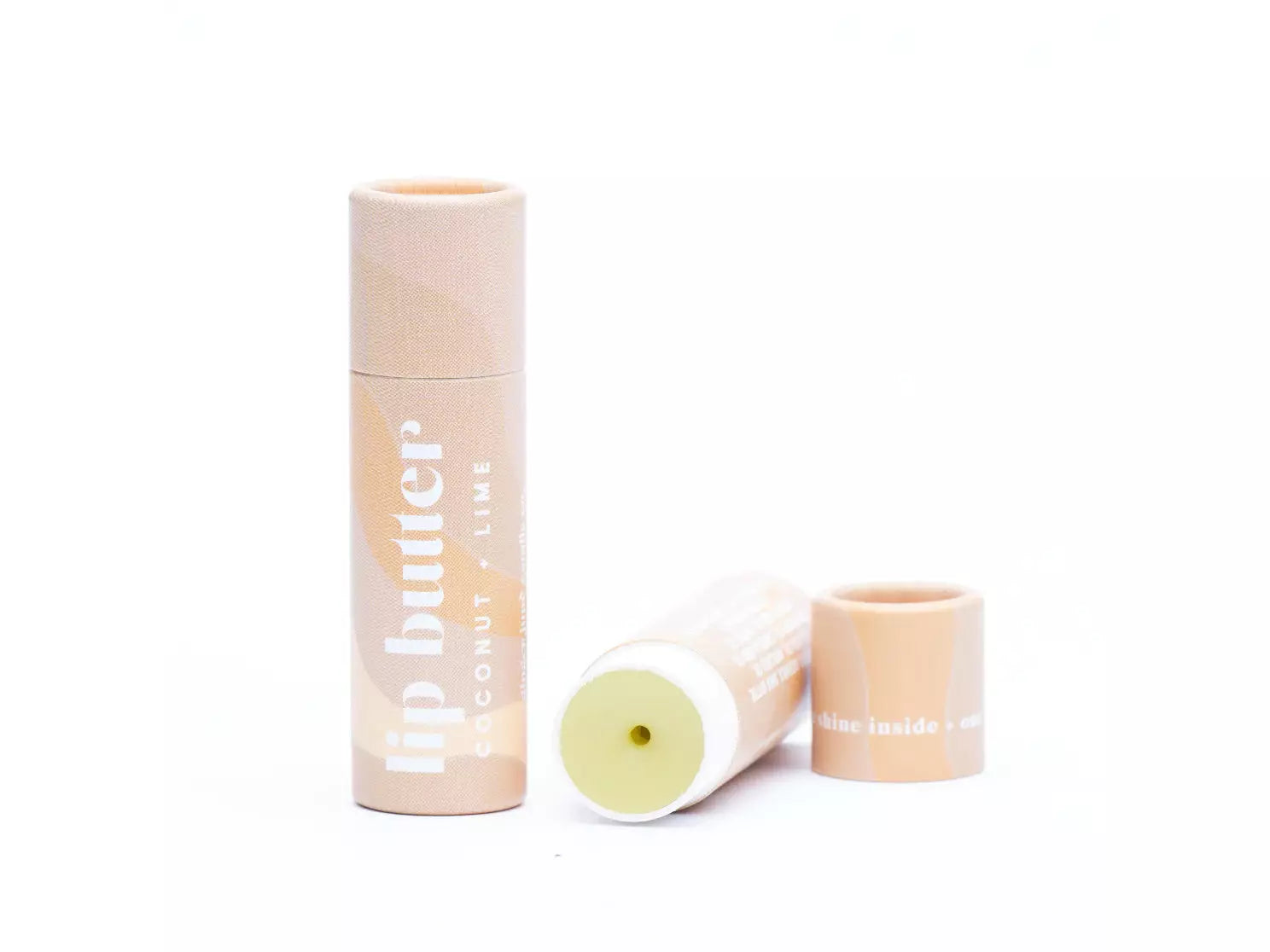 ginger june candle co coconut + lime botanically infused beeswax lip butter lip balm in cardboard tube